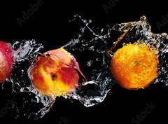 Fototapeta papr 360 x 266, 148249825 - Set of fresh fruits in water splash isolated on black background - Sada erstvho ovoce v stkajc vod izolovan na ernm pozad