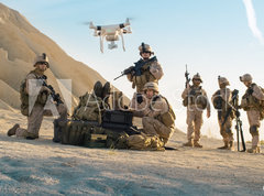 Samolepka flie 270 x 200, 164038449 - Soldiers are Using Drone for Scouting During Military Operation in the Desert.