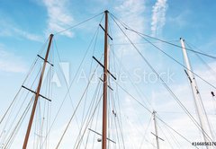 Samolepka flie 145 x 100, 166856176 - Masts of sailboat and blue sky