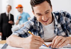 Samolepka flie 145 x 100, 167182957 - Close up of young architect drawing a line - Zblzka mladho architekta kreslen ry