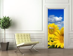 Samolepka na dvee flie 90 x 220  Some yellow sunflowers against a wide field and the blue sky, 90 x 220 cm