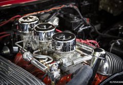 Fototapeta papr 184 x 128, 170543646 - Under the Hood View of Restored Vintage Automobile Engine with Tri-Power Show-Chrome Carburetors