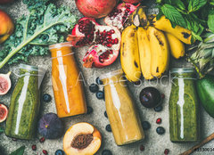 Fototapeta254 x 184  Flat lay of colorful smoothies in bottles with fresh tropical fruit and vegetables on concrete background, top view. Healthy, clean eating, vegan, vegetarian, detox, dieting breakfast food concept, 254 x 184 cm