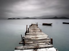 Fototapeta pltno 330 x 244, 19438246 - Looking over a desolate peer and a boat