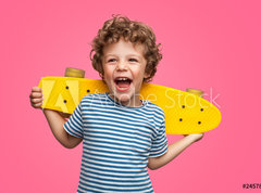 Fototapeta330 x 244  Happy curly boy laughing and holding skateboard, 330 x 244 cm