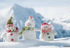 Fototapeta pltno 174 x 120, 26166286 - Happy snowmans in mountain