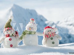 Fototapeta vliesov 270 x 200, 26166286 - Happy snowmans in mountain