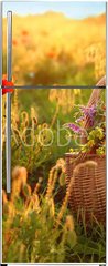 Samolepka na lednici flie 80 x 200, 276027409 - Basket of wildflowers with straw hat in sunlit poppy field