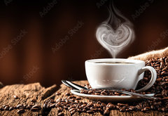 Fototapeta pltno 174 x 120, 286399259 - White Cup Of Hot Coffee With Heart Shaped Steam On Old Weathered Table With Burlap Sack And Beans