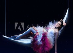 Fototapeta100 x 73  Beauty brunette lying on the crescent moon, 100 x 73 cm