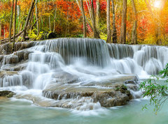 Fototapeta pltno 330 x 244, 296784817 - Colorful majestic waterfall in national park forest during autumn, panorama