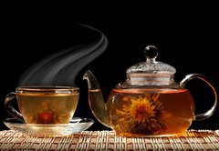 Samolepka flie 145 x 100, 30284293 - Glass teapot and a cup of green tea on a black background