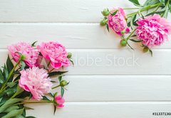 Fototapeta pltno 174 x 120, 313371368 - Pink peony flowers on white wooden table. womans day or wedding background. Top view.