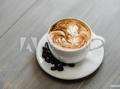 Fototapeta pltno 330 x 244, 320686754 - Fresh brewed coffee with fern pattern latte art in white cup
