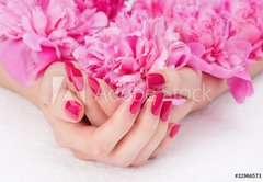 Fototapeta174 x 120  Woman cupped hands with pink manicure holding a flower, 174 x 120 cm