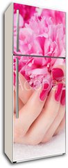 Samolepka na lednici flie 80 x 200  Woman cupped hands with pink manicure holding a flower, 80 x 200 cm
