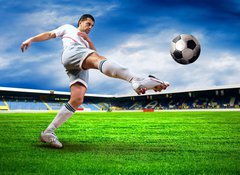 Fototapeta vliesov 100 x 73, 33670525 - Happiness football player after goal on the field of stadium wit