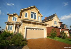 Fototapeta184 x 128  Two new two storied beige stone and brick cottage with garage, 184 x 128 cm