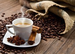 Fototapeta100 x 73  Coffee cup with burlap sack of roasted beans on rustic table, 100 x 73 cm