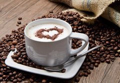 Fototapeta184 x 128  Coffee cup with burlap sack of roasted beans on rustic table, 184 x 128 cm