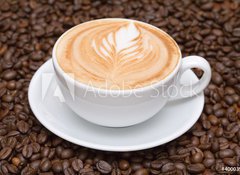 Fototapeta100 x 73  Coffee cup with coffee beans background, 100 x 73 cm