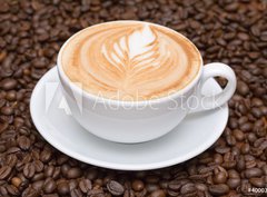 Fototapeta330 x 244  Coffee cup with coffee beans background, 330 x 244 cm