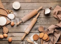 Fototapeta vliesov 200 x 144, 405324068 - Ingredients for cookies and rolling pins on wooden background