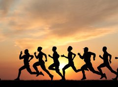 Fototapeta330 x 244  Marathon, black silhouettes of runners on the sunset, 330 x 244 cm