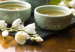Fototapeta pltno 174 x 120, 42047983 - Green tea with jasmine in cup and teapot on wooden table