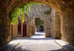 Samolepka flie 145 x 100, 43877162 - Medieval arched street in the old town of Rhodes, Greece - Stedovk obloukov ulice ve starm mst Rhodos v ecku