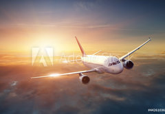 Fototapeta174 x 120  Airplane in the sky at sunset, 174 x 120 cm