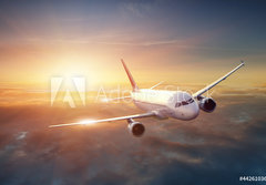 Fototapeta184 x 128  Airplane in the sky at sunset, 184 x 128 cm