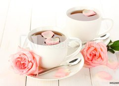 Fototapeta pltno 240 x 174, 45200948 - cups of tea with roses on white wooden table - lek aje s r na blm devnm stole