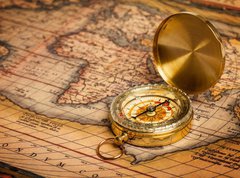 Fototapeta vliesov 270 x 200, 45304733 - Old vintage golden compass on ancient map