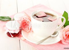 Fototapeta100 x 73  cup of tea with roses and jam on white wooden table, 100 x 73 cm