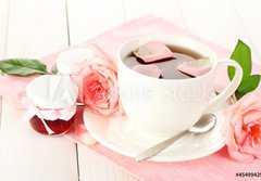 Fototapeta184 x 128  cup of tea with roses and jam on white wooden table, 184 x 128 cm