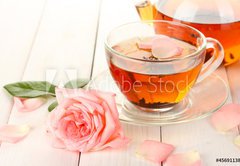 Fototapeta174 x 120  teapot and cup of tea with roses on white wooden table, 174 x 120 cm