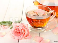 Fototapeta330 x 244  teapot and cup of tea with roses on white wooden table, 330 x 244 cm