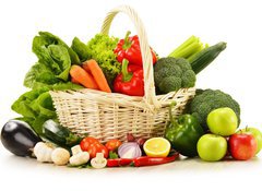 Fototapeta100 x 73  raw vegetables in wicker basket isolated on white, 100 x 73 cm