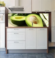 Fototapeta do kuchyn flie 180 x 60  ripe avocado cut in half on a wooden table, 180 x 60 cm