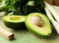 Fototapeta papr 360 x 266, 52535934 - ripe avocado cut in half on a wooden table