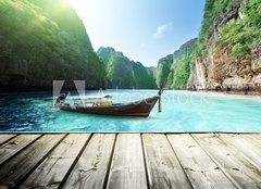 Fototapeta254 x 184  rock of Phi Phi island in Thailand and wooden platform, 254 x 184 cm