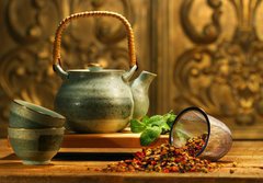 Fototapeta184 x 128  Asian herb tea on an old rustic table, 184 x 128 cm