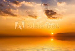 Samolepka flie 145 x 100, 58094630 - Beautiful sunset with clouds reflected in water.