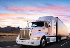 Fototapeta145 x 100  Truck and highway at sunset  transportation background, 145 x 100 cm