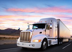 Fototapeta160 x 116  Truck and highway at sunset  transportation background, 160 x 116 cm