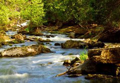 Fototapeta145 x 100  Water rushing among rocks in river rapids in Ontario Canada, 145 x 100 cm