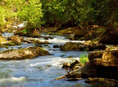 Fototapeta330 x 244  Water rushing among rocks in river rapids in Ontario Canada, 330 x 244 cm