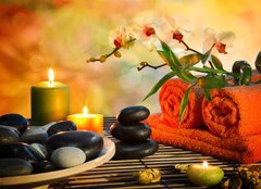 Fototapeta pltno 240 x 174, 59390339 - preparation for massage in orange lights and black stones