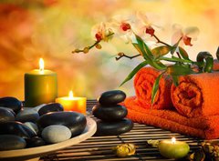 Fototapeta pltno 330 x 244, 59390339 - preparation for massage in orange lights and black stones